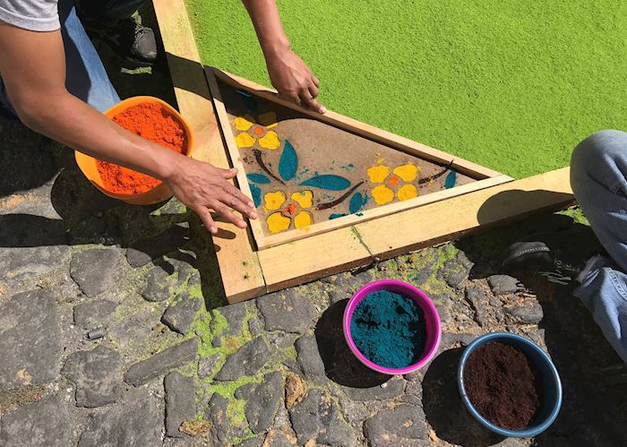 Locals creating their 'alfombra' during Semana Santa