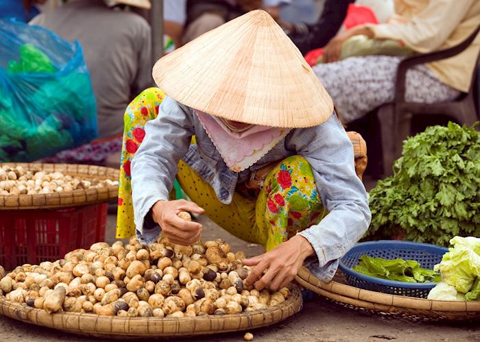 Street market seller in Ho Chi Minh City