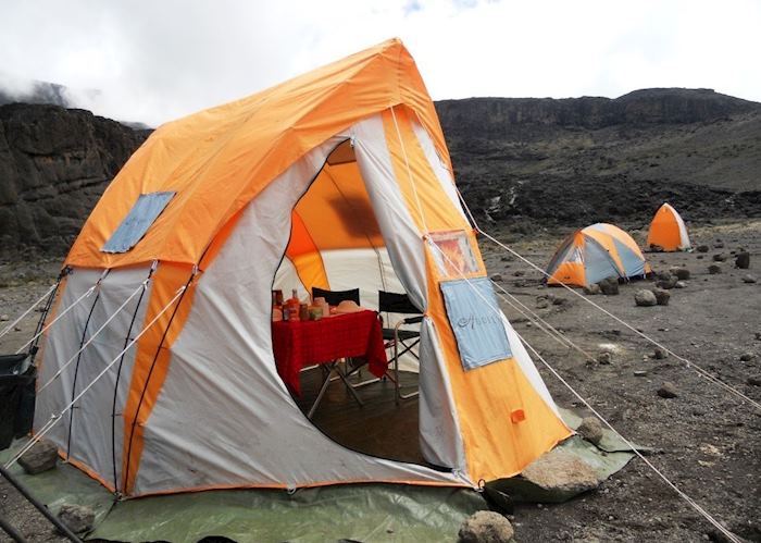 Dining tent, with standard tent and toilet tent in background, Mount Kilimanjaro