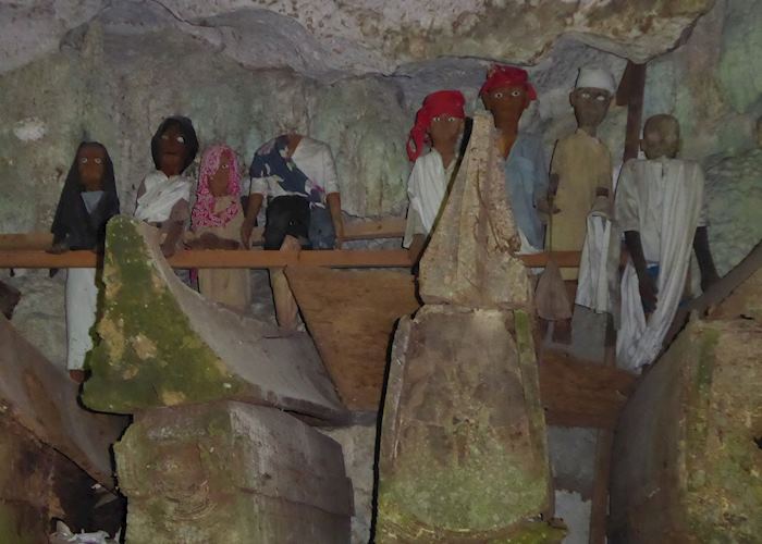 Tau-taus inside the cave of Tampangallo