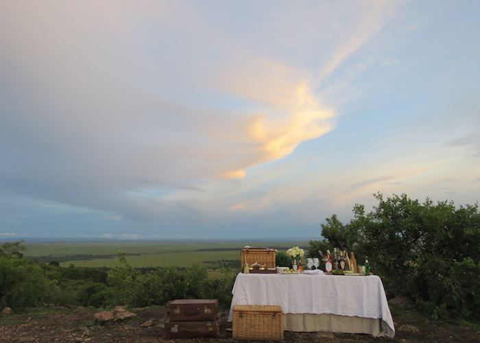 Sundowners looking over the Masai Mara from Bateleur Camp