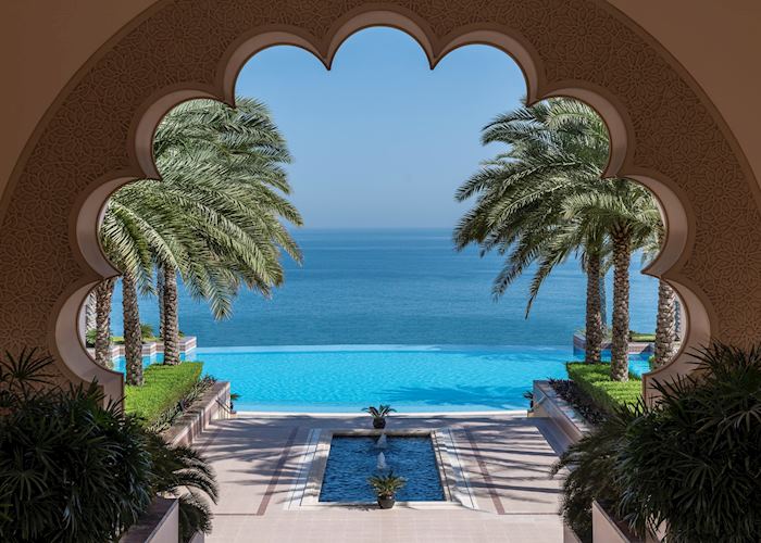 Al Husn pool through courtyard arch, Shangri-La Al Husn Resort & Spa, Muscat