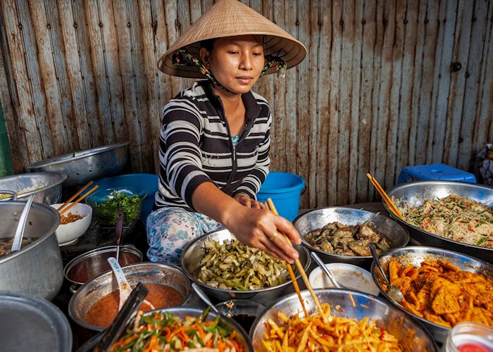 Vietnamese woman selling street food