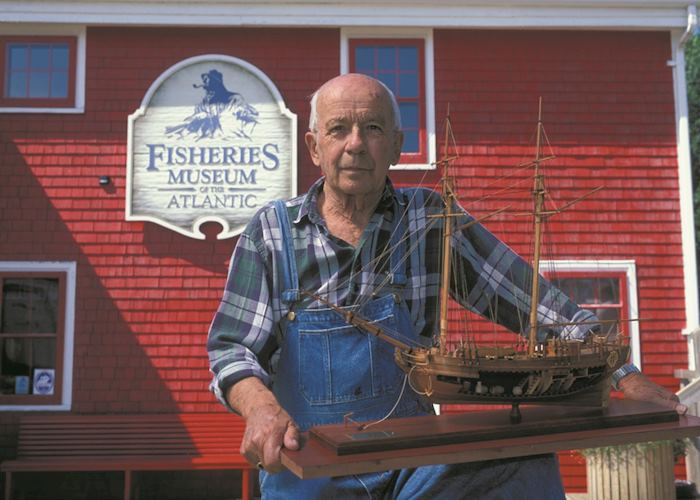 Model ship builder outside the Fisheries Museum of the Atlantic, Lunenburg