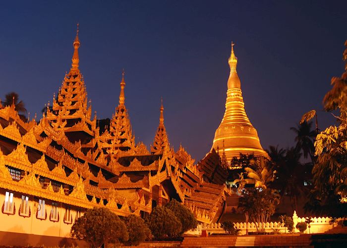 The Shwedagon Pagoda shines bright in the evening