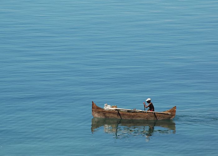 Fisherman in a pirogue off Nosy Komba