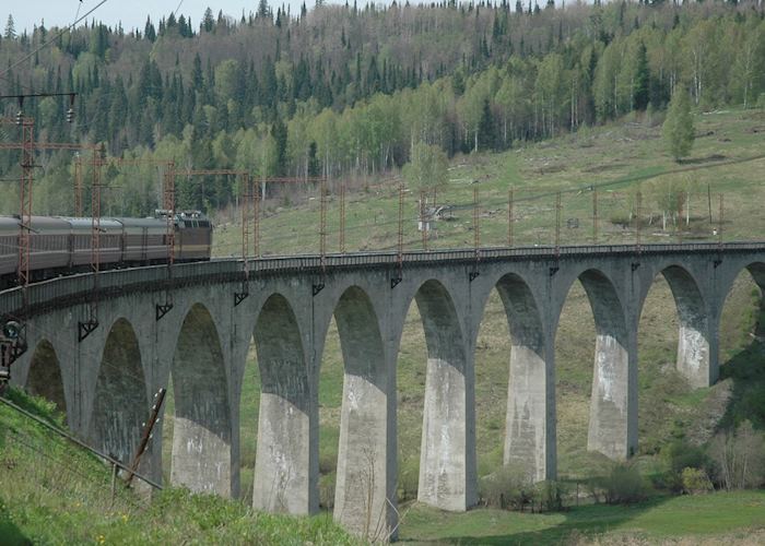 Trans-siberian train crossing a bridge