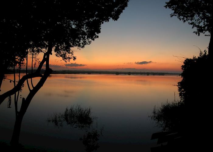 Sun rise from Lamanai over New River Lagoon