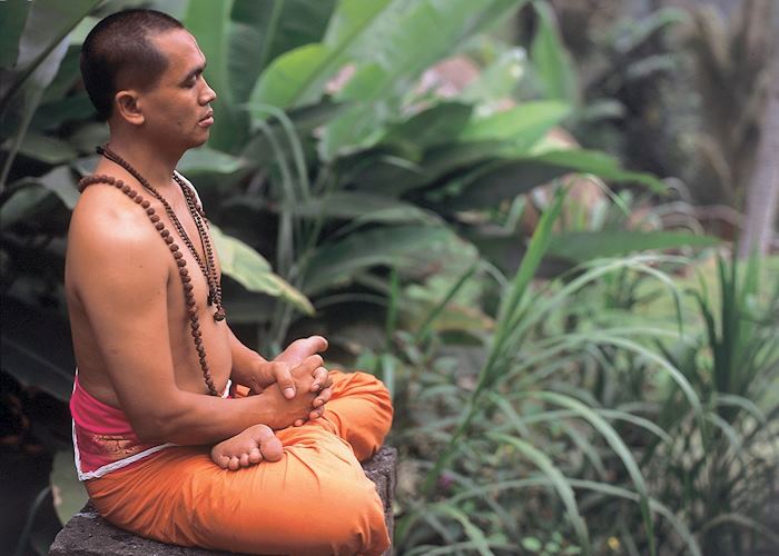 Buddhist man meditating, Bali