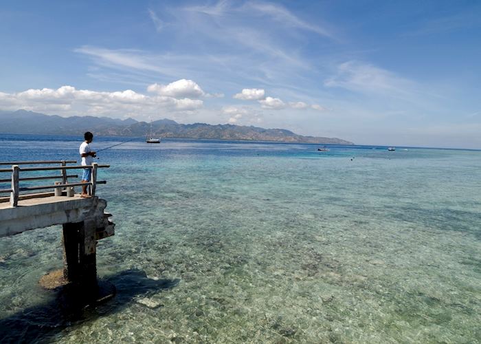 Boy fishing on Gili Trawangan, Indonesia