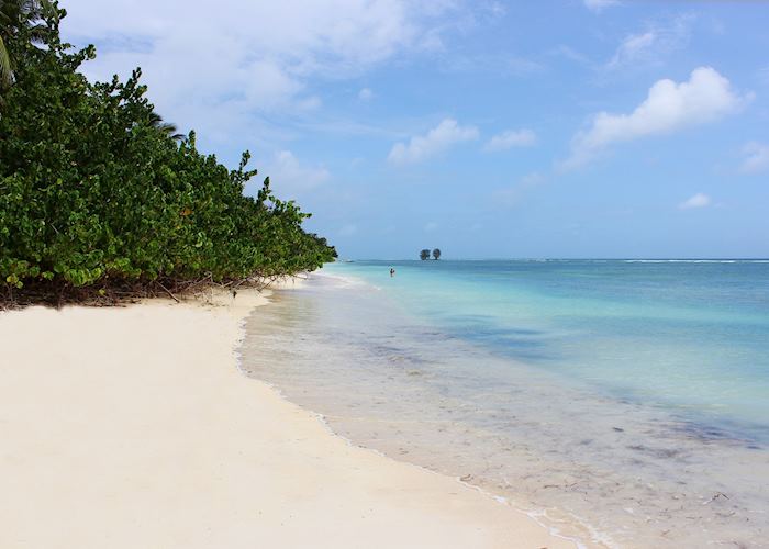 The beach at Le Repaire Boutique Hotel, La Digue