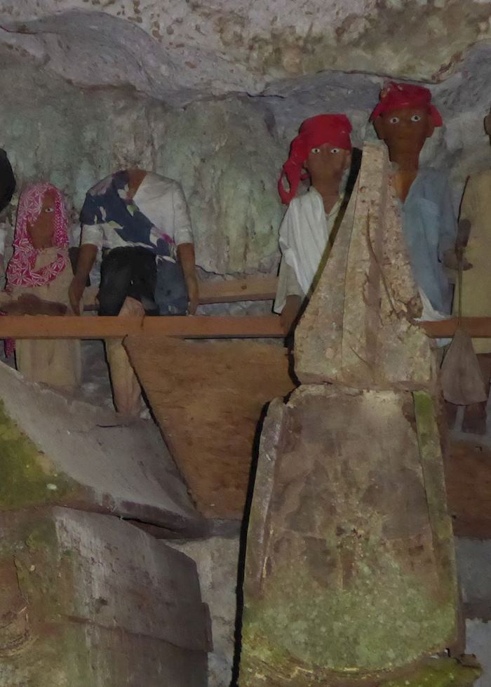 Tau-taus inside the cave of Tampangallo