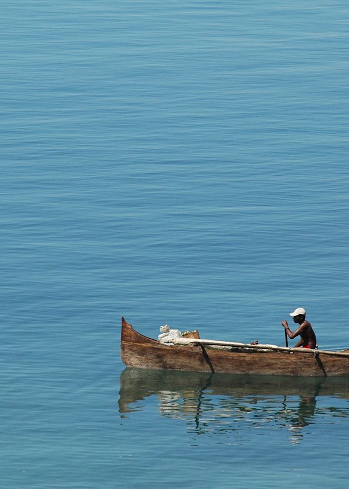 Fisherman in a pirogue off Nosy Komba