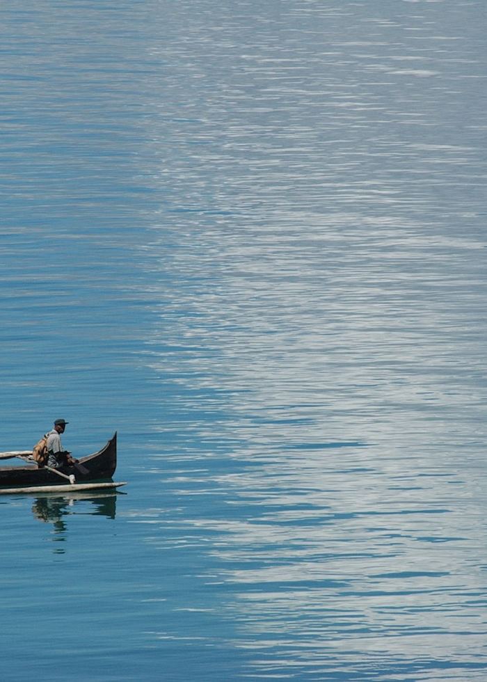 Fishermen in a pirogue off Nosy Komba