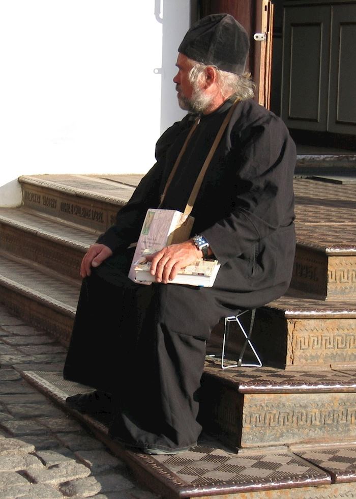 Old monk on steps, Moscow