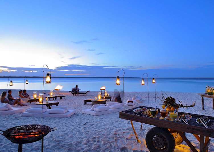 Beach dining, Mnemba Island Lodge, Tanzania
