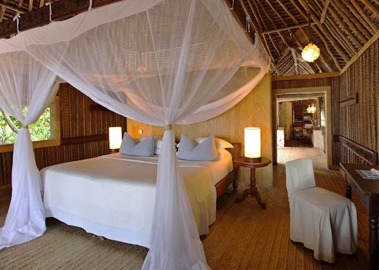 Banda bedroom, Mnemba Island Lodge, Tanzania