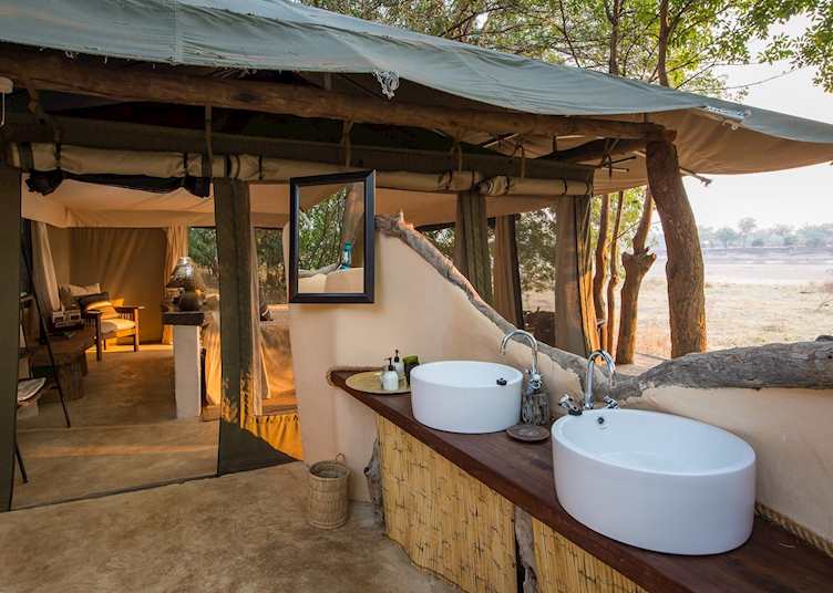 En suite, open air bathroom at Tena Tena