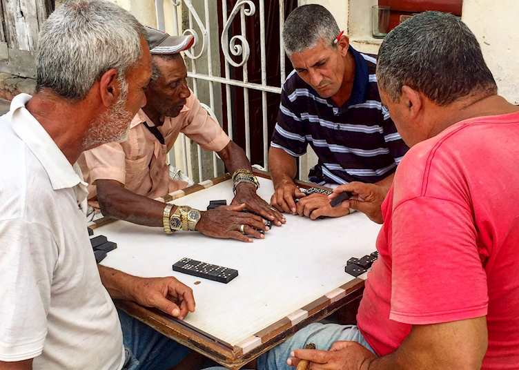 Men playing dominoes in Cuba
