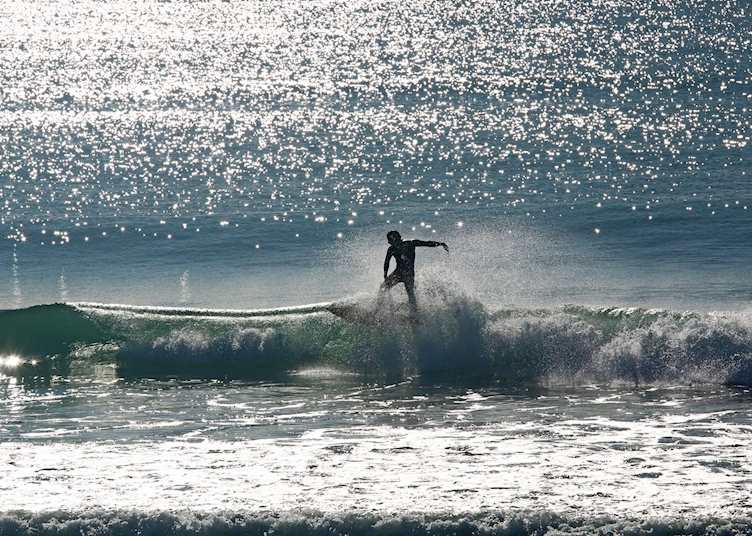 Surfing in the Bay of Plenty, New Zealand