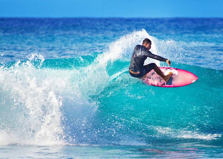 Surfer in Kauai, Hawaii