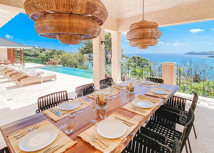 Outdoor dining area and view over the bay