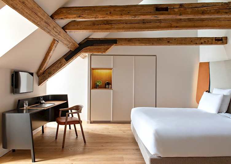 A double room with rustic beams