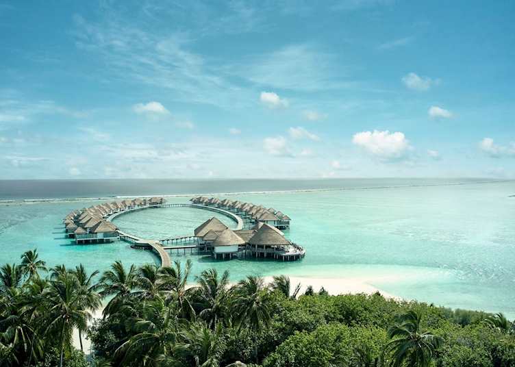 An aerial view of COMO Maalifushi's water villas