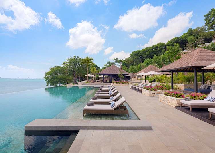 Pool area and Loloan beach club, Raffles Bali