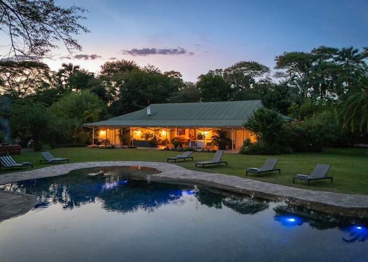 Swimming pool and farmhouse, Waterberry Zambezi Lodge 