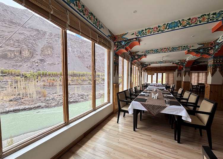 River facing dining space at Apricot Tree, Nurla