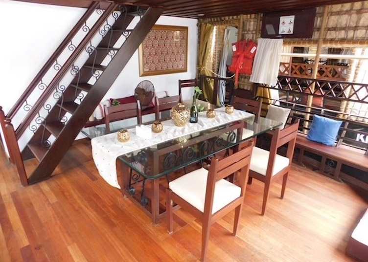 Dining area on a houseboat at Kerala