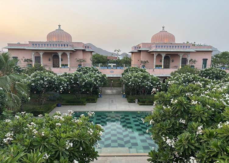 View of the pool and gardens from the rooftop at Bujera Fort