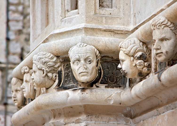 Faces on Cathedral of Saint James, Šibenik