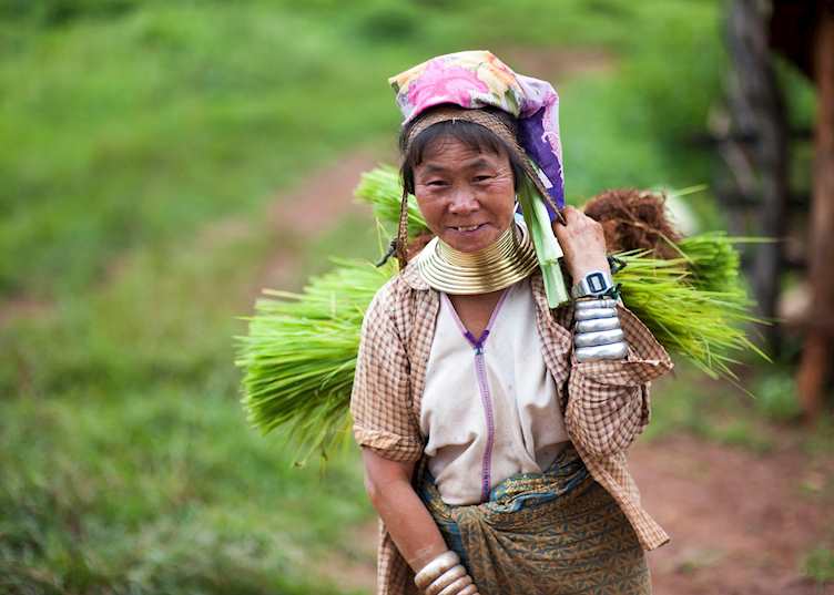 Padaung elder returning from the paddy fields, Loikaw, Myanmar