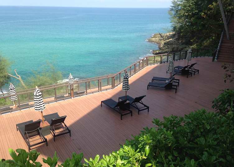 Relax in the sun and enjoy the views of the turquoise water below.
