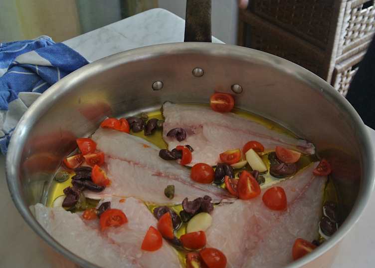 Cooking fish at Casa Laura's 