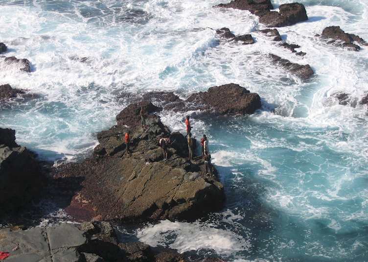 Boys fishing off the rocks, Coffee Bay