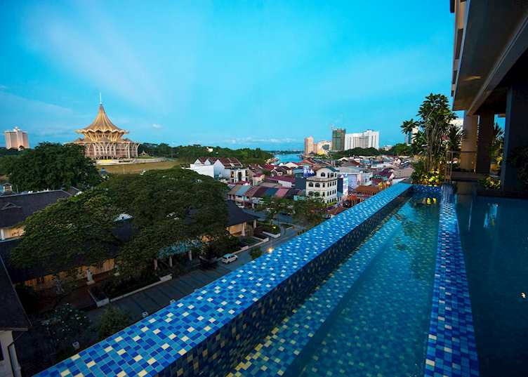 View from the infinity pool at the Waterfront Hotel, overlooking the river and the parliament buildings