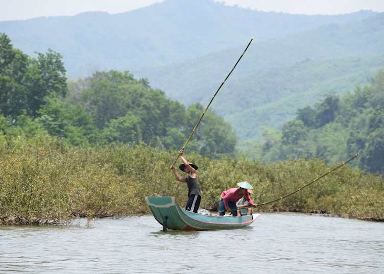 Fishermen scaring fish
