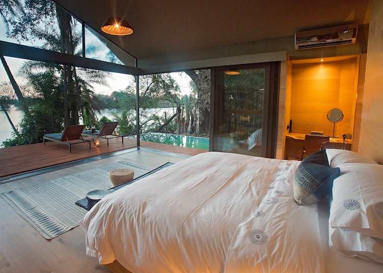 Bright and airy rooms overlook the river at Thorntree River Lodge
