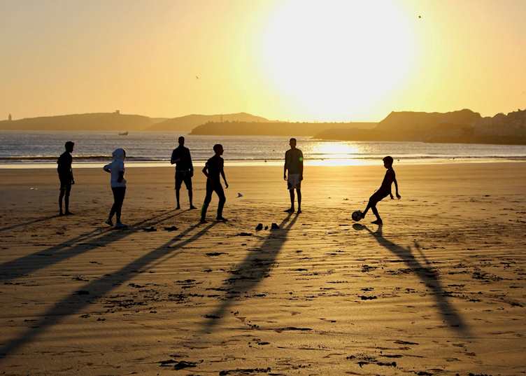 A group of young Moroccans playing soccer