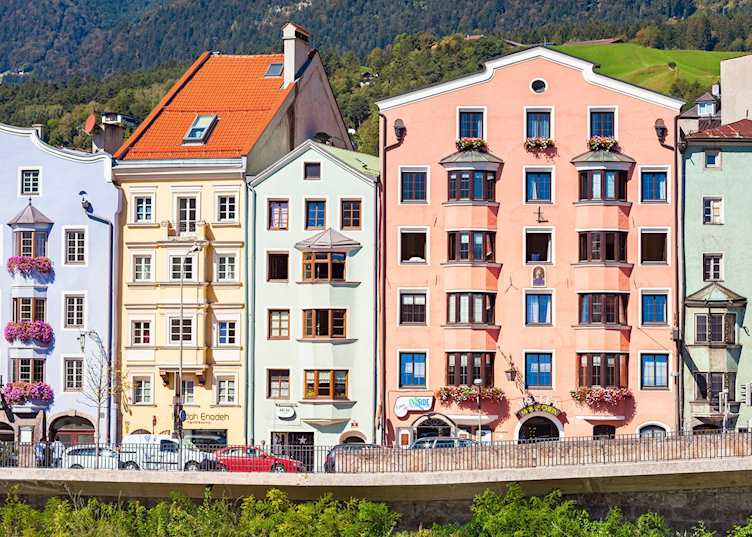 Innsbruck's pastel houses on the edge of the Inn river