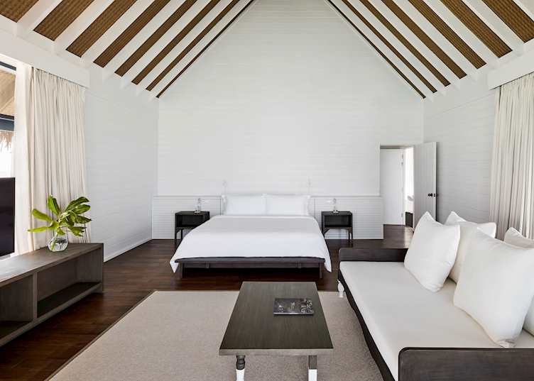 A water villa's master bedroom, COMO Cocoa Island