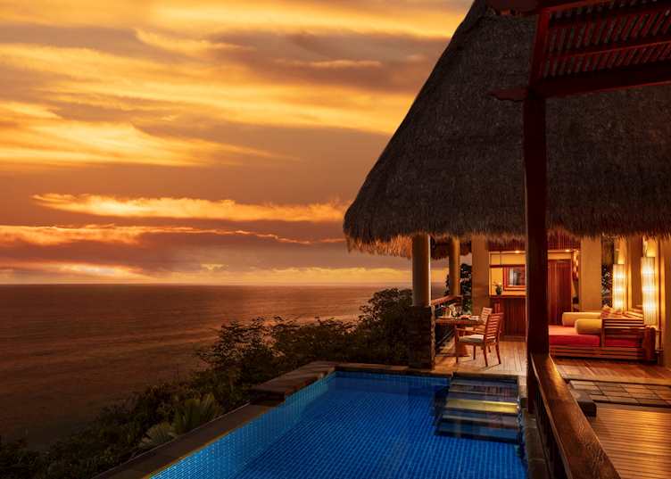 A Premier Ocean View Villa at sunset, Anantara Maia Resort & Spa