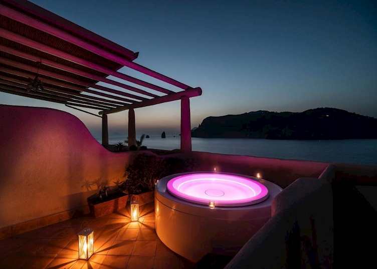 Outdoor Jacuzzi at Therasia Resort Sea & Spa