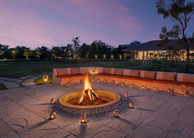 Bonfire by the lake at The Oberoi Vindhyavilas
