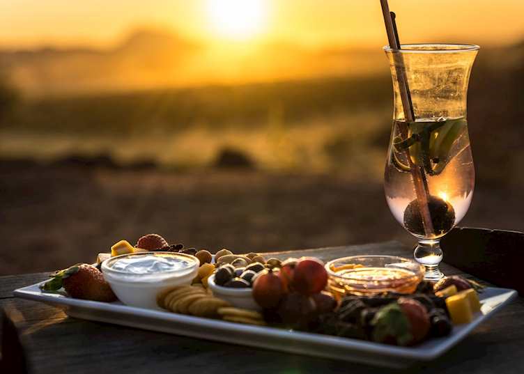 Sundowners at Camp Kipwe, Damaraland, Namibia