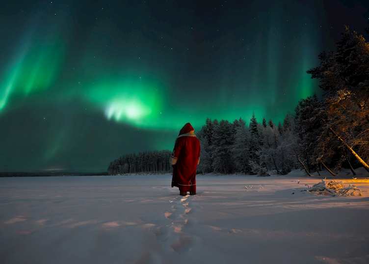 Santa Claus and northern lights, Finnish Lapland 