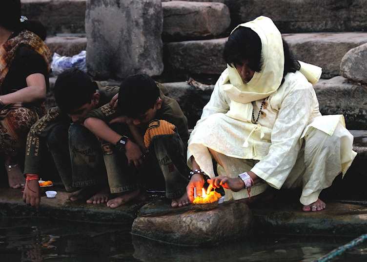 Personal puja on the Ganges river, Varanasi